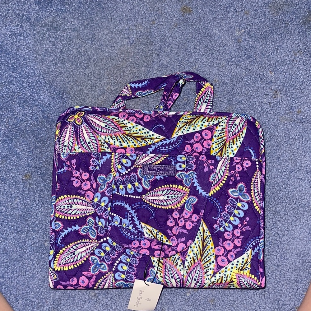 This is a purple designed Vera Bradley Handing Organizer